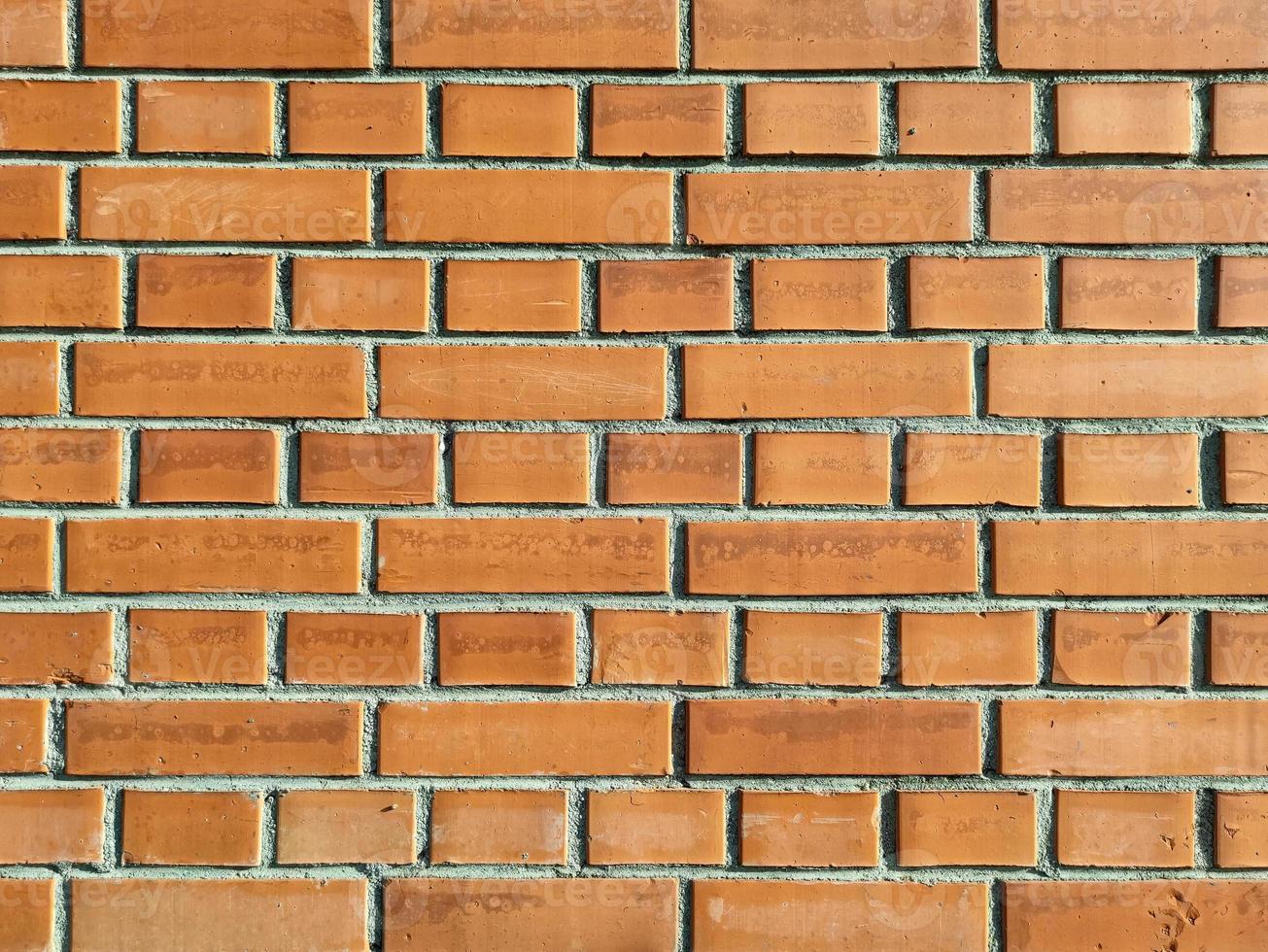 Full Frame background texture of red brick wall photo