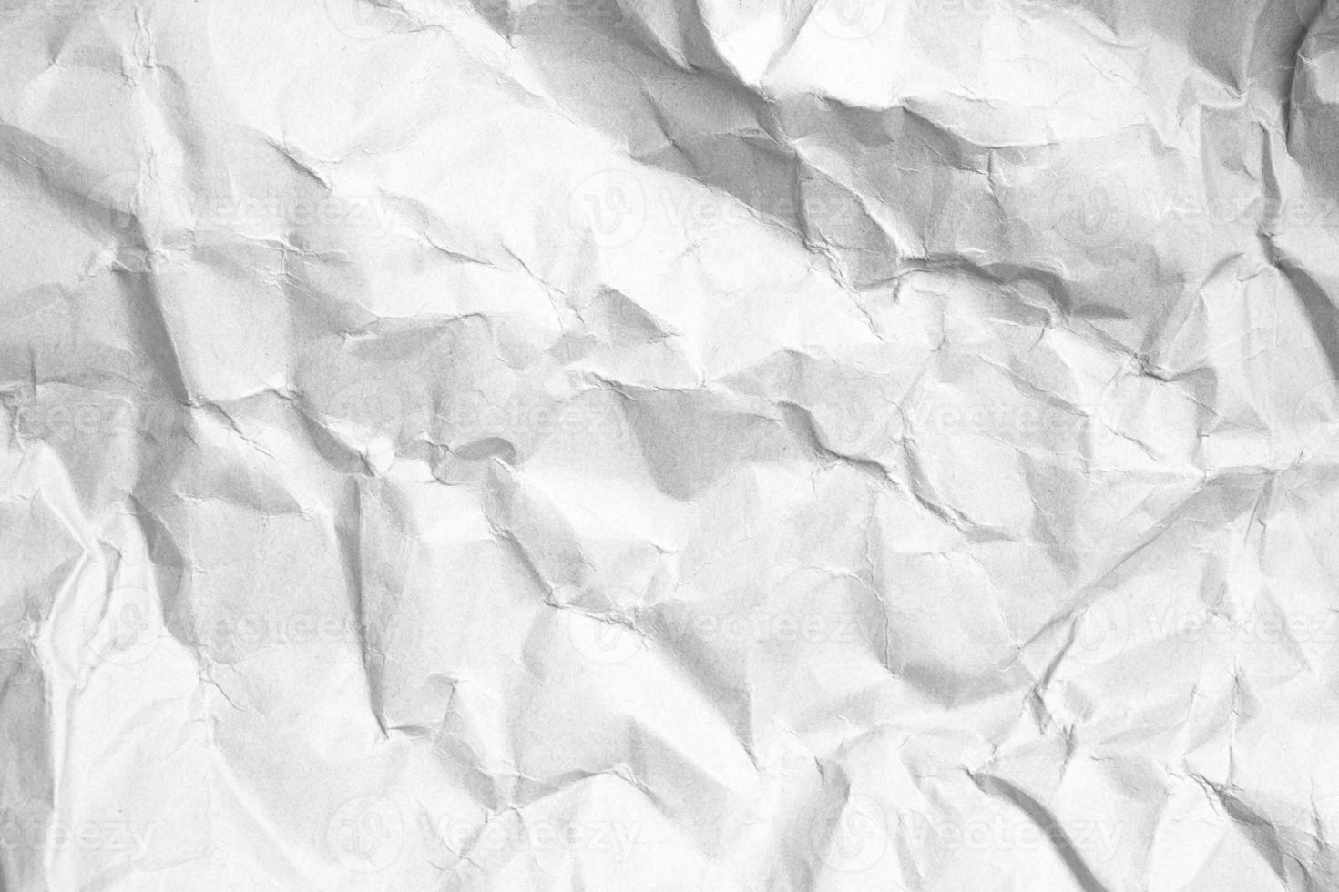 Beautiful crumpled white paper background texture photo
