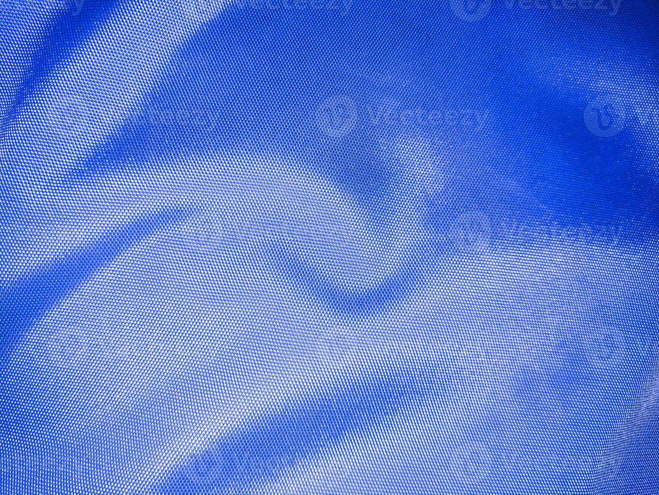 Close up of polyester textured blue synthetical background photo