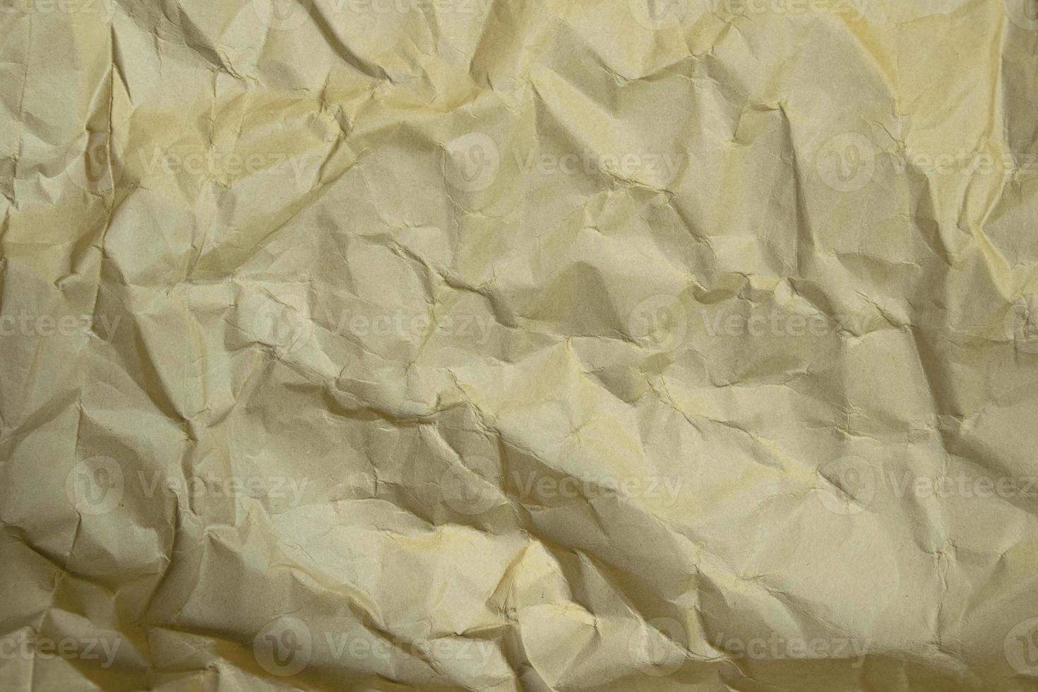 Beautiful close up crumpled old  paper background texture photo