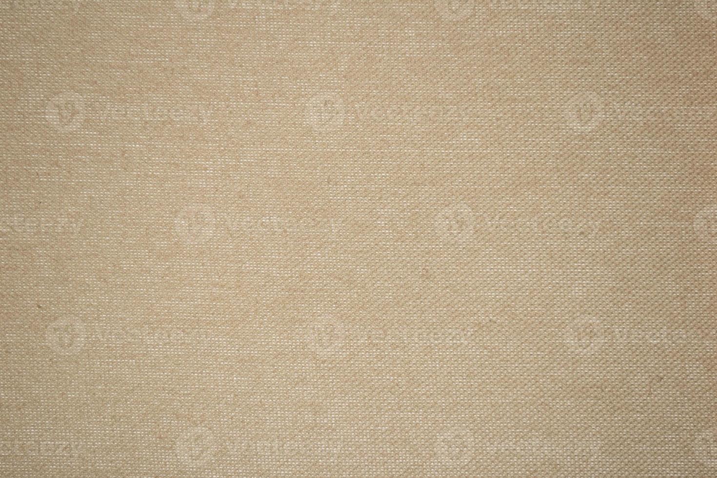 A beige fabric background texture full frame photo