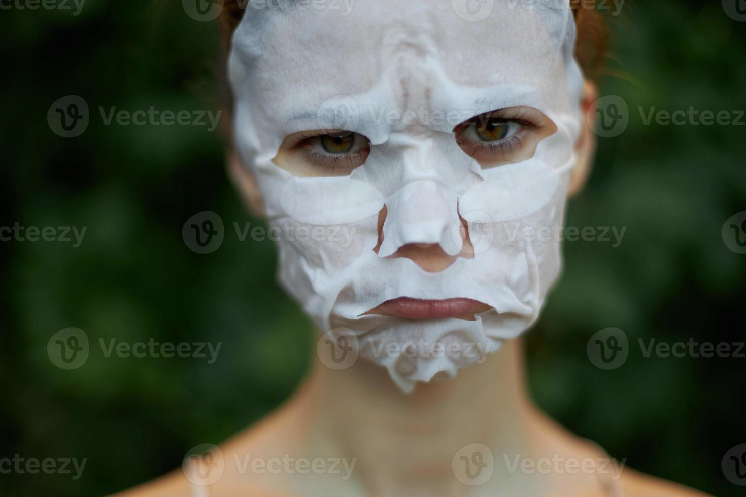 Beautiful woman face Age wrinkles sad face mask rejuvenation photo