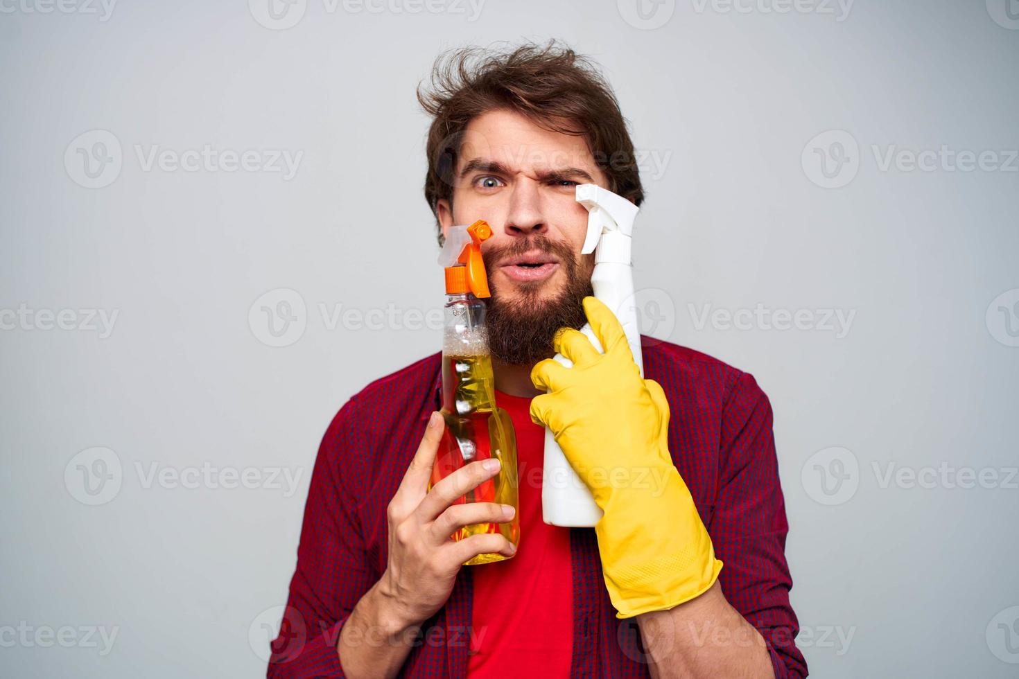 emotional man cleaning service lifestyle detergent cropped view photo