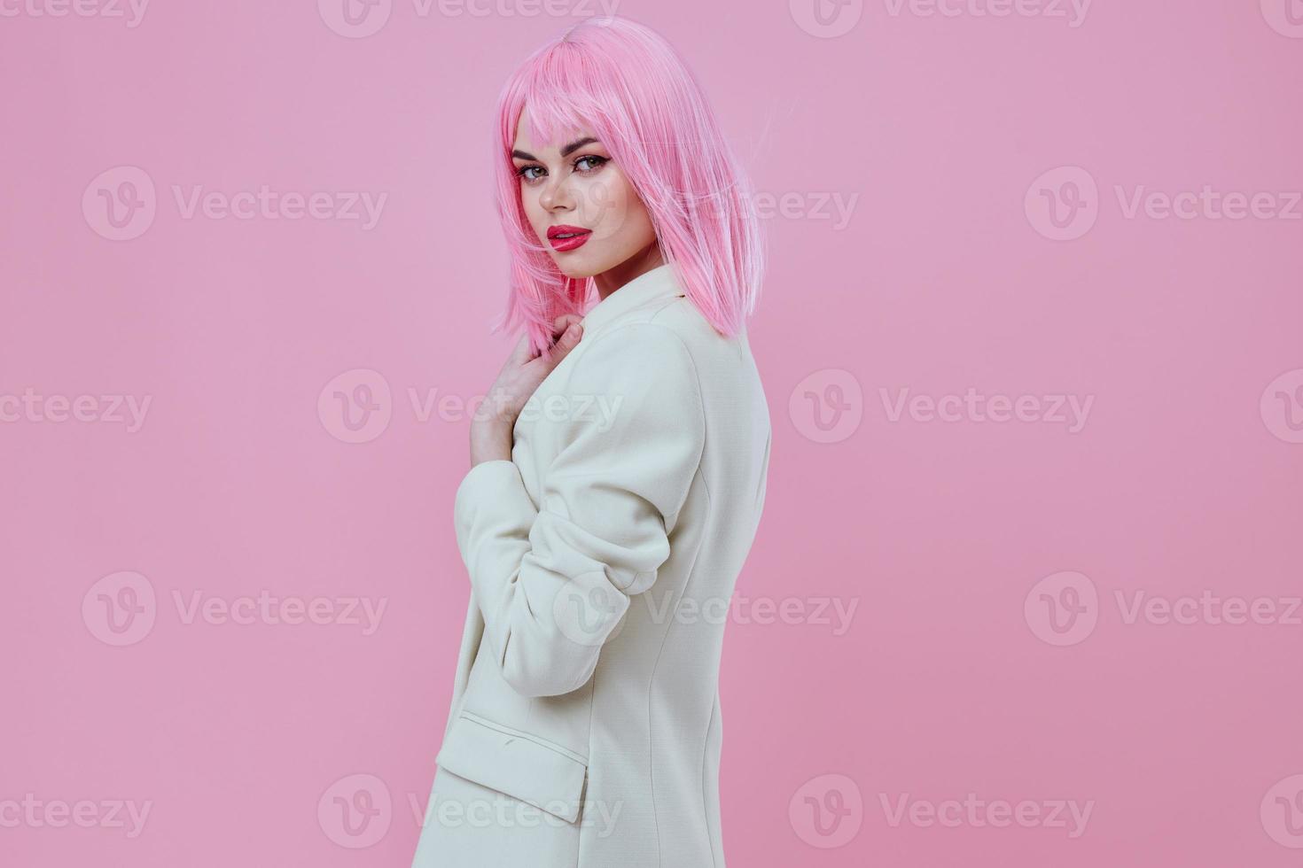 Pretty young female in a suit makeup pink hair posing color background unaltered photo