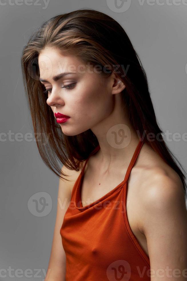 Woman with makeup on her face red lipstick dress glamor photo