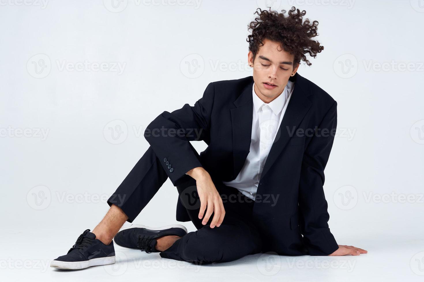 cute guy in suit curly hair blazer fashion self confidence photo