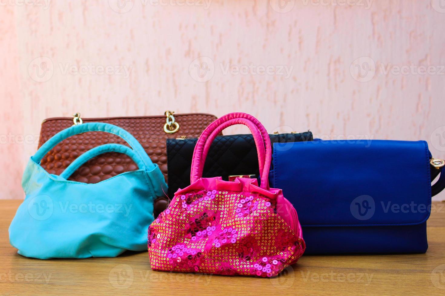 colored handbags closeup photo