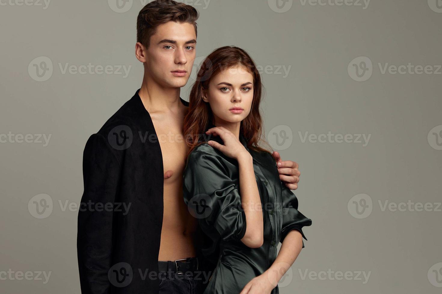 cute young couple attractive look romance hug studio photo