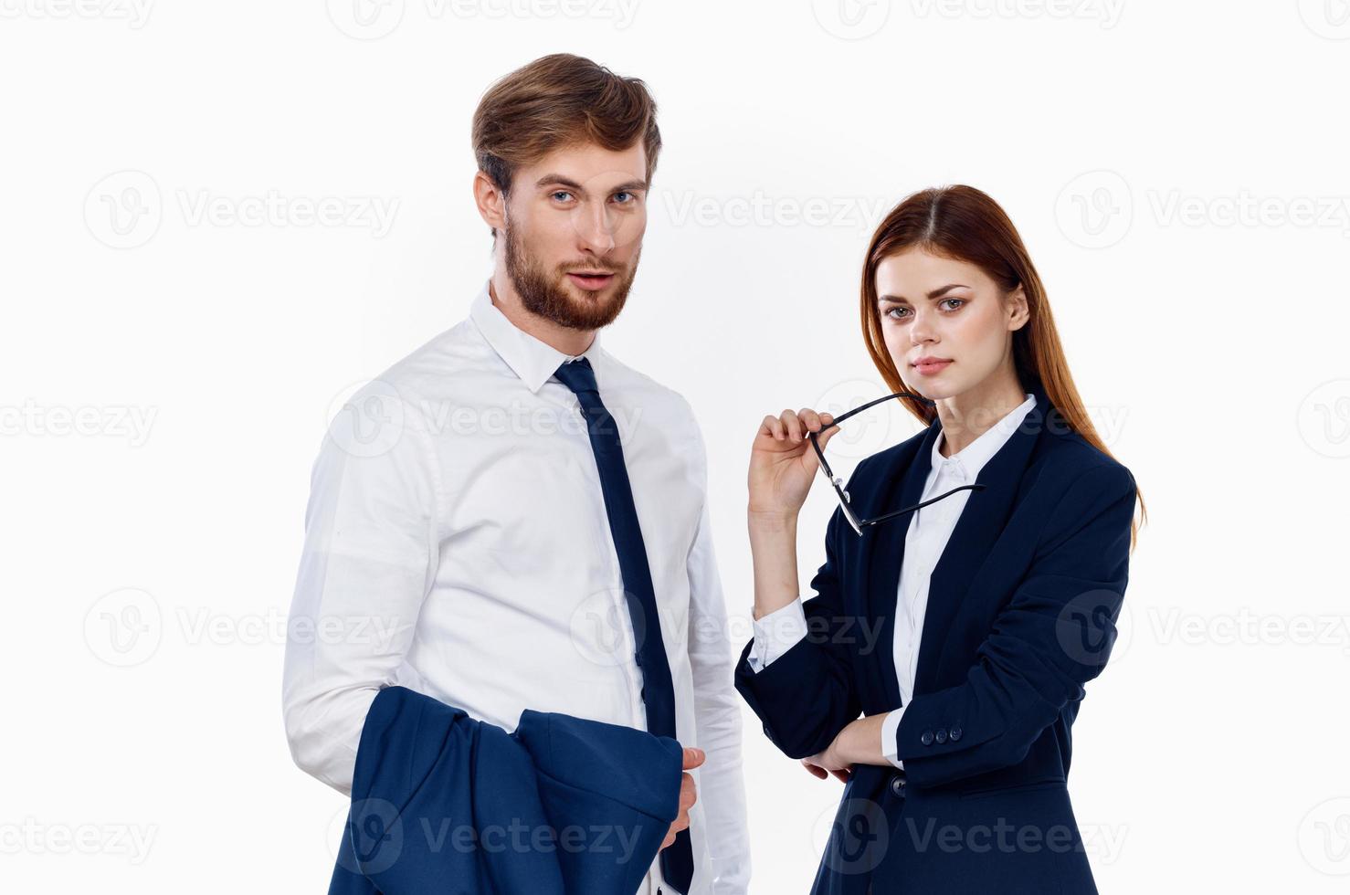 man and woman in suits working office professional photo