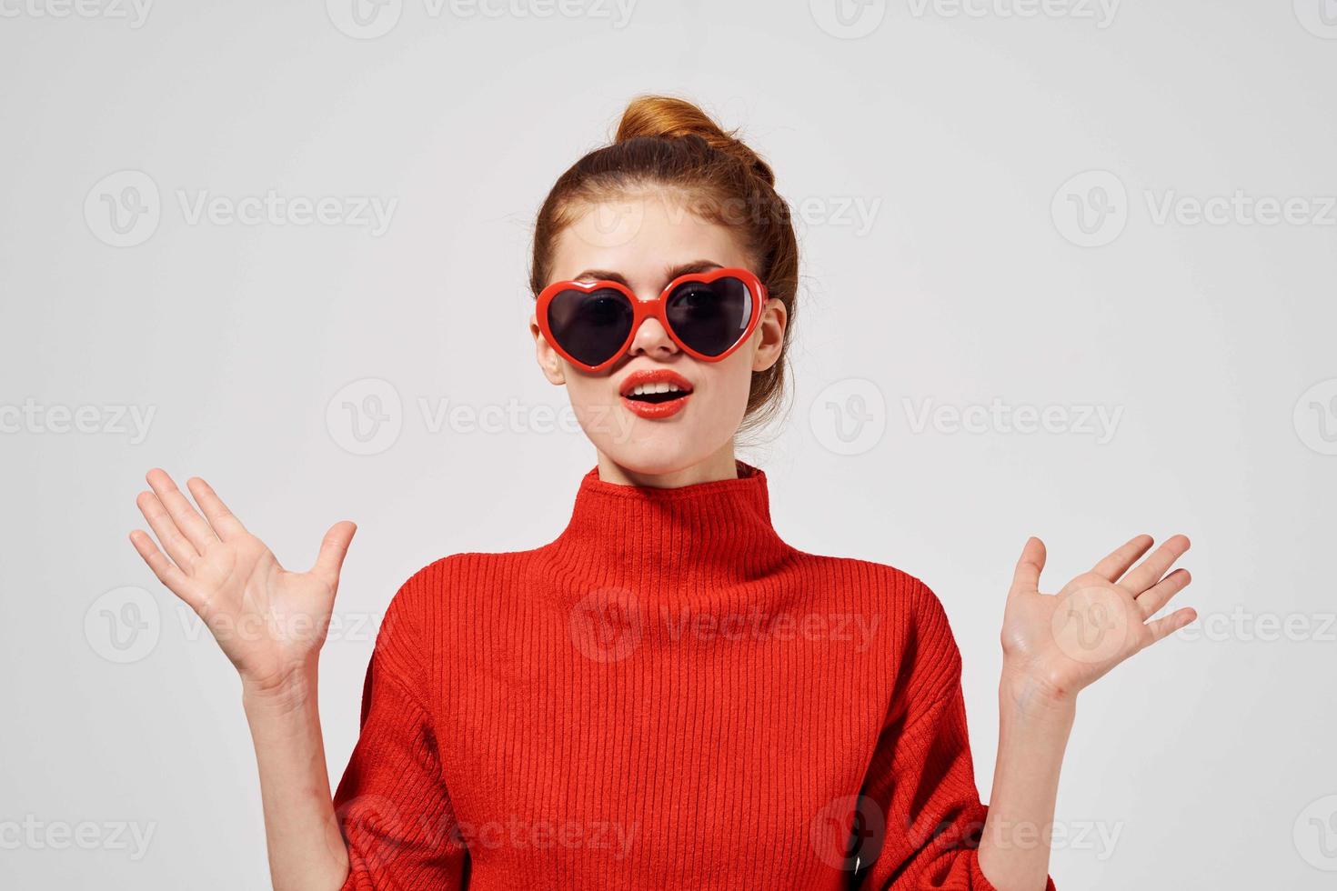 beautiful woman in a red sweater isolated background photo