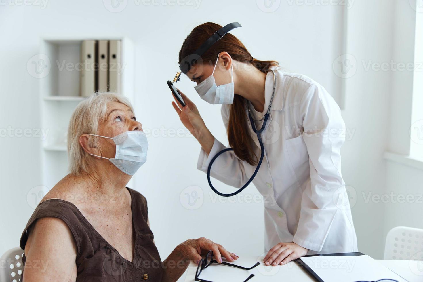 female doctor stethoscope in hand health care photo