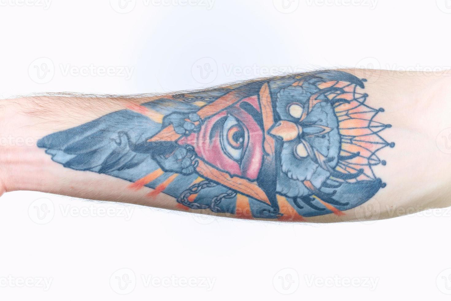 tattoo on arm close-up lifestyle light background photo