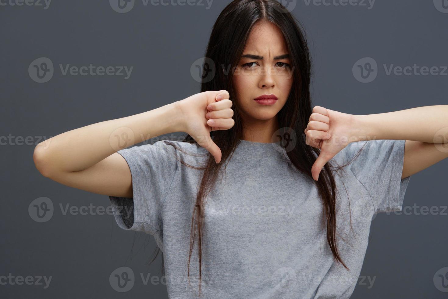 pretty woman in a t-shirt and jeans posing Youth style isolated background photo
