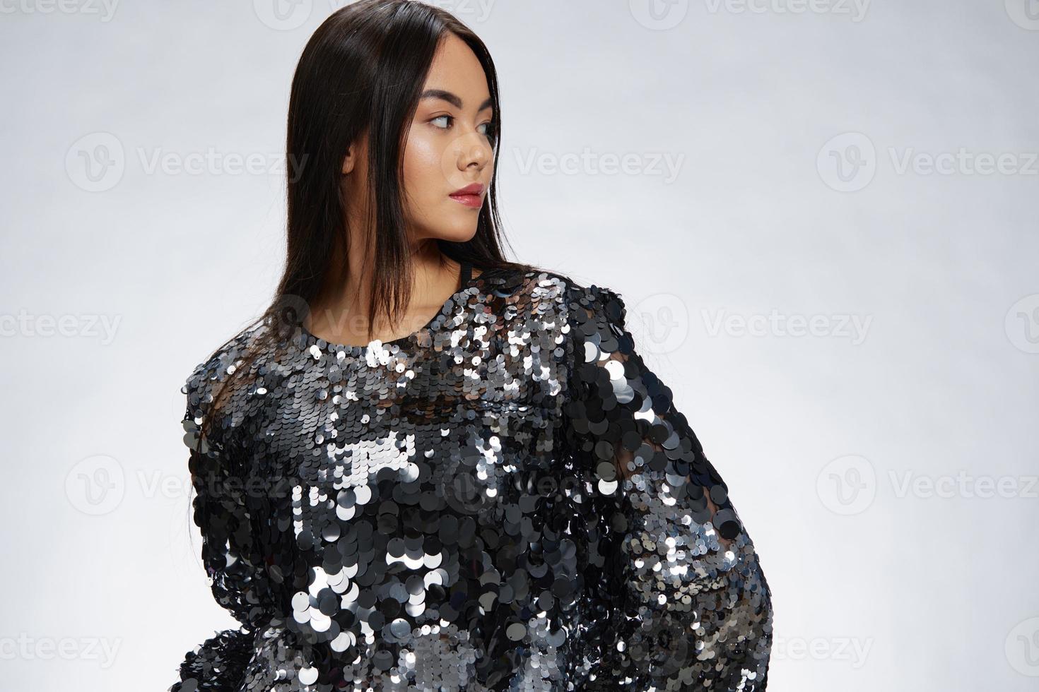 young woman shiny jacket fashion posing luxury studio model photo