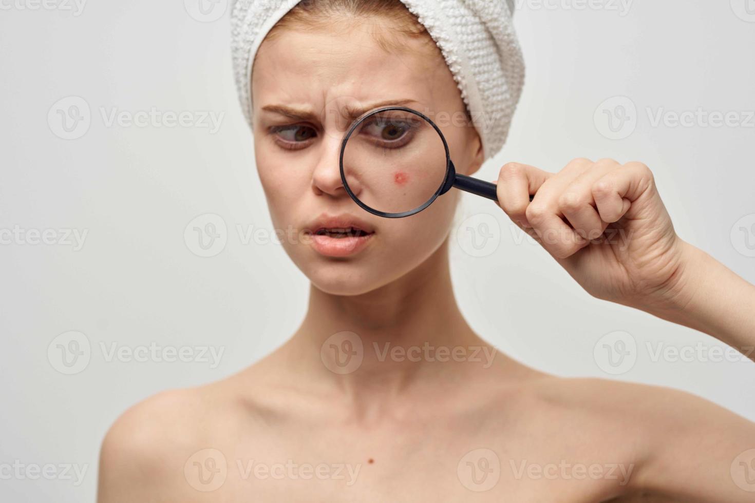 woman with a towel on my head dermatology isolated background photo