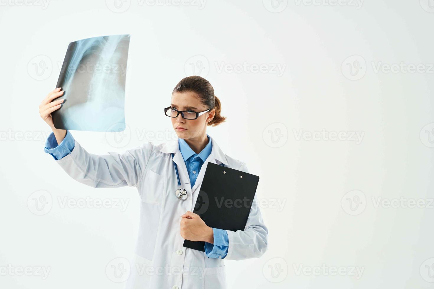 female doctor in white coat x-ray diagnostics laboratory research photo