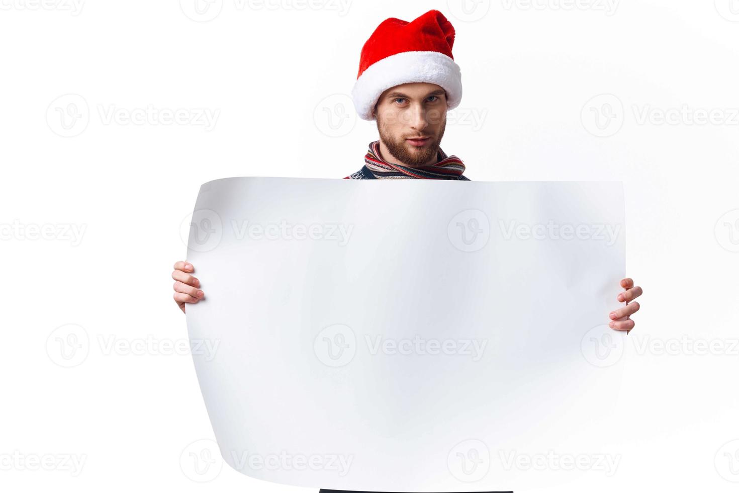 Cheerful man white paper billboard advertising copy-space studio photo