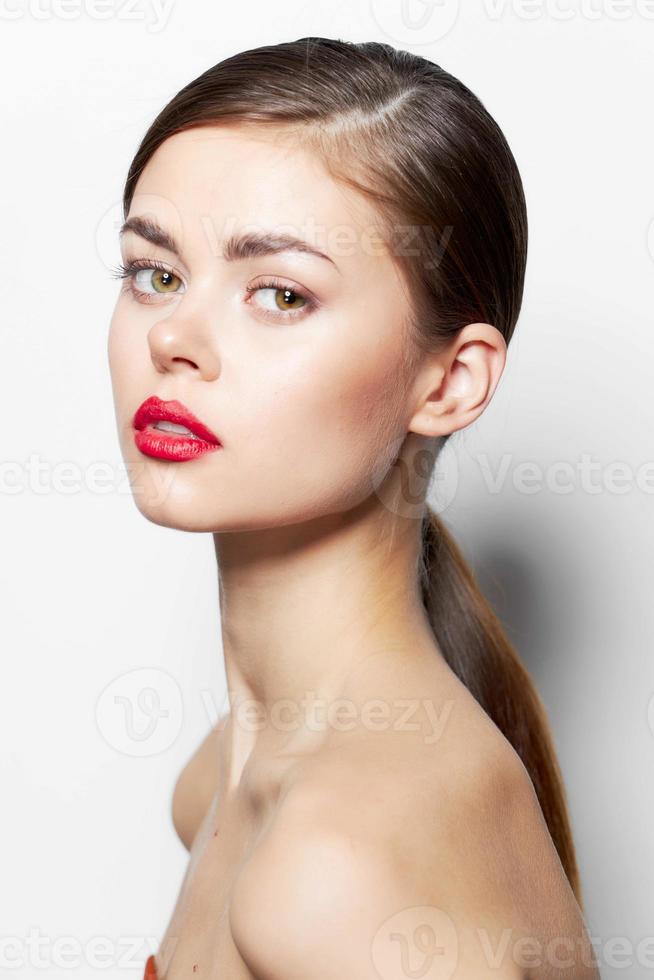 Beautiful glamor woman naked shoulders attractive look red lips photo