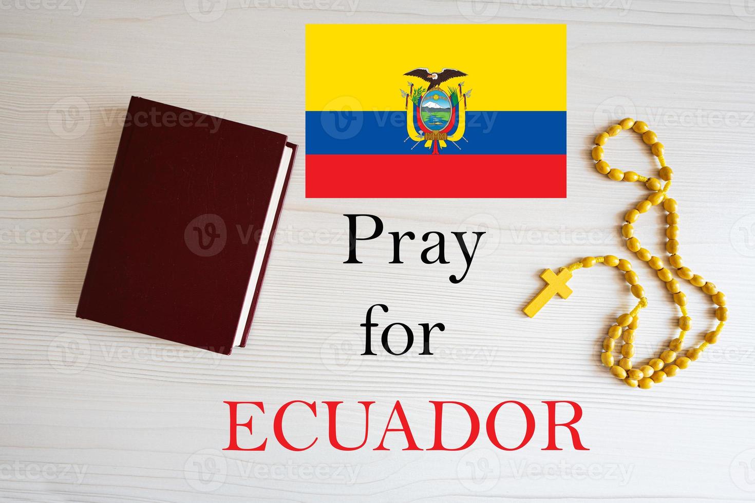 Pray for Ecuador. Rosary and Holy Bible background. photo