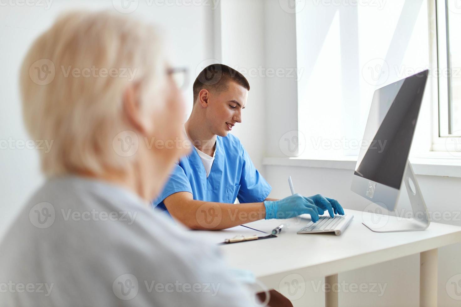 elderly woman patient at the doctor's health care photo