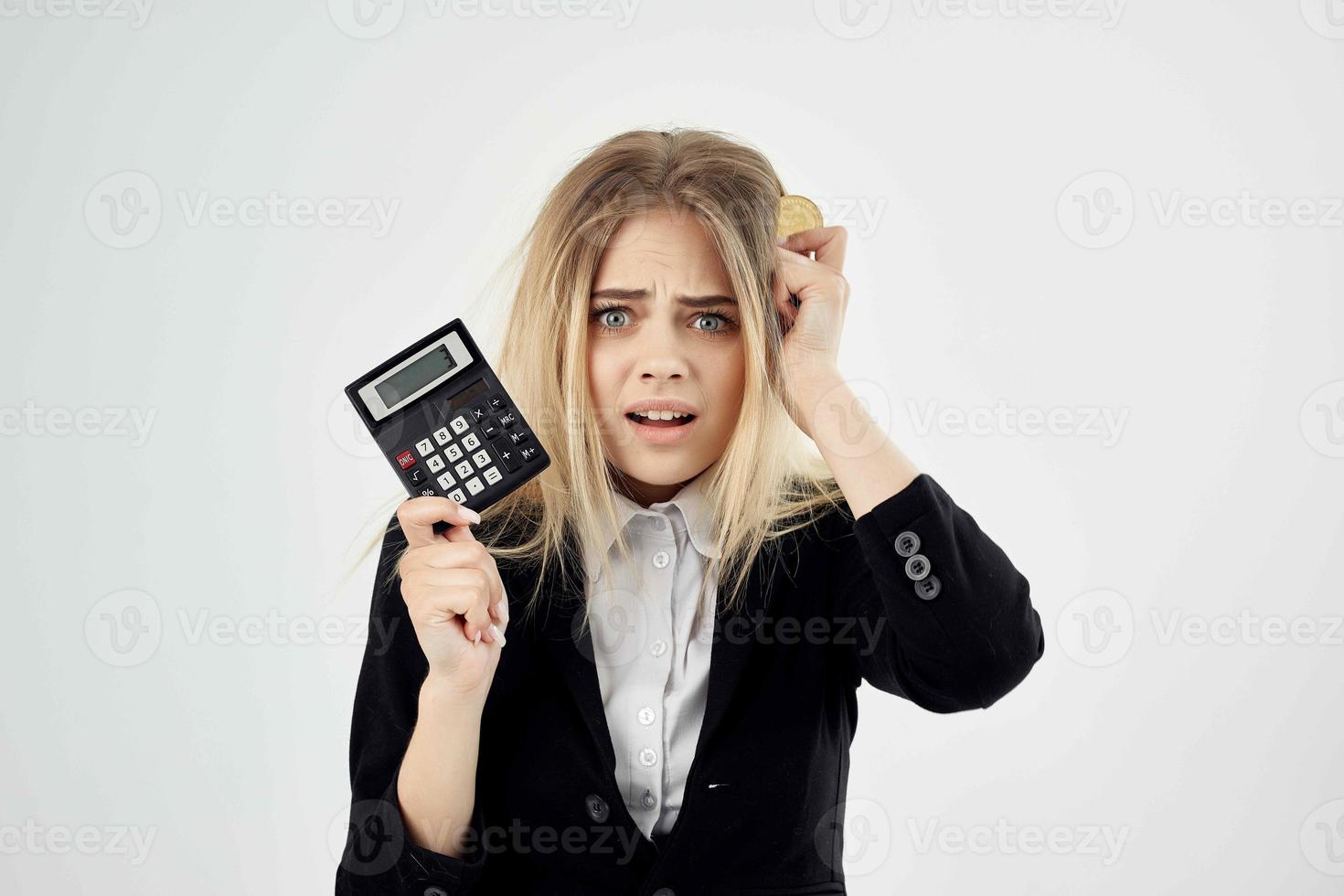 Business woman with calculator and coin Bitcoin finance economy photo