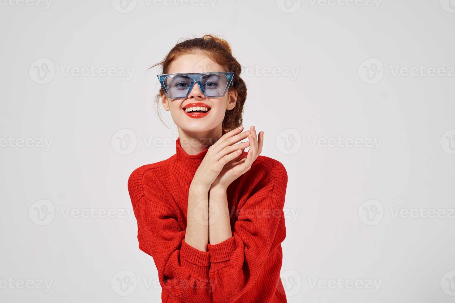 beautiful woman fashionable blue glasses posing light background photo