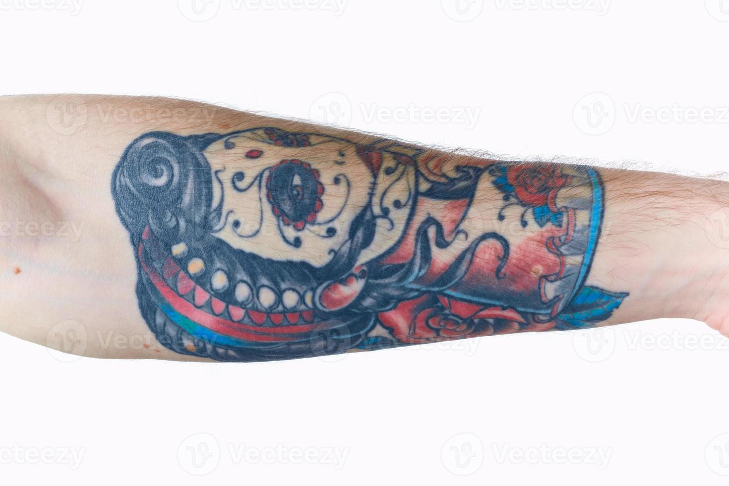 tattoo on arm close-up lifestyle light background photo