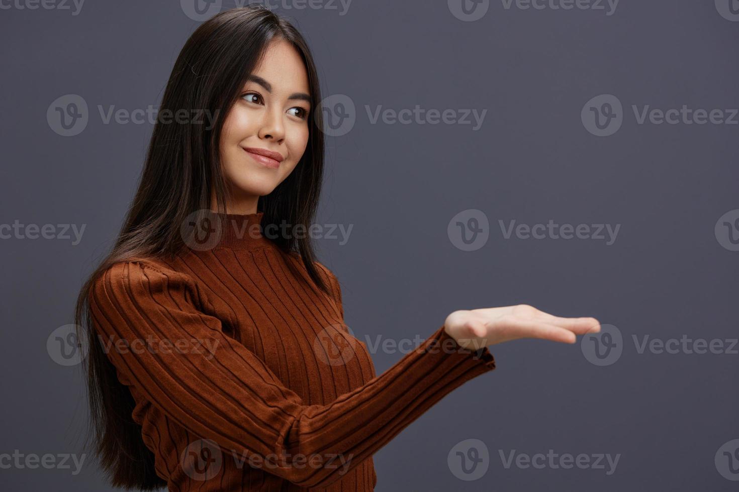 Brunette brown sweater glamor posing smile fashion isolated background photo