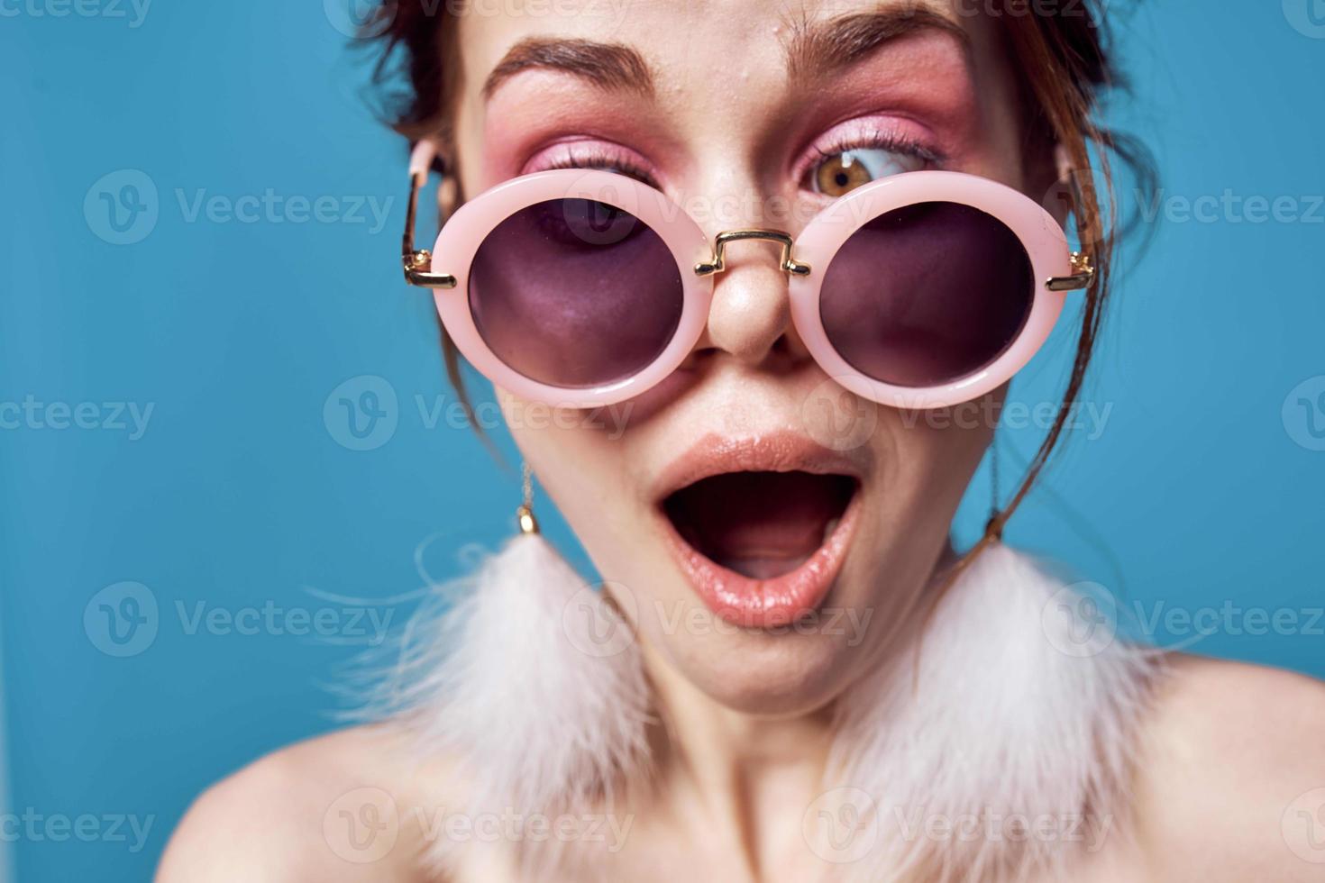 cheerful woman with bare shoulders round glasses decoration emotions photo