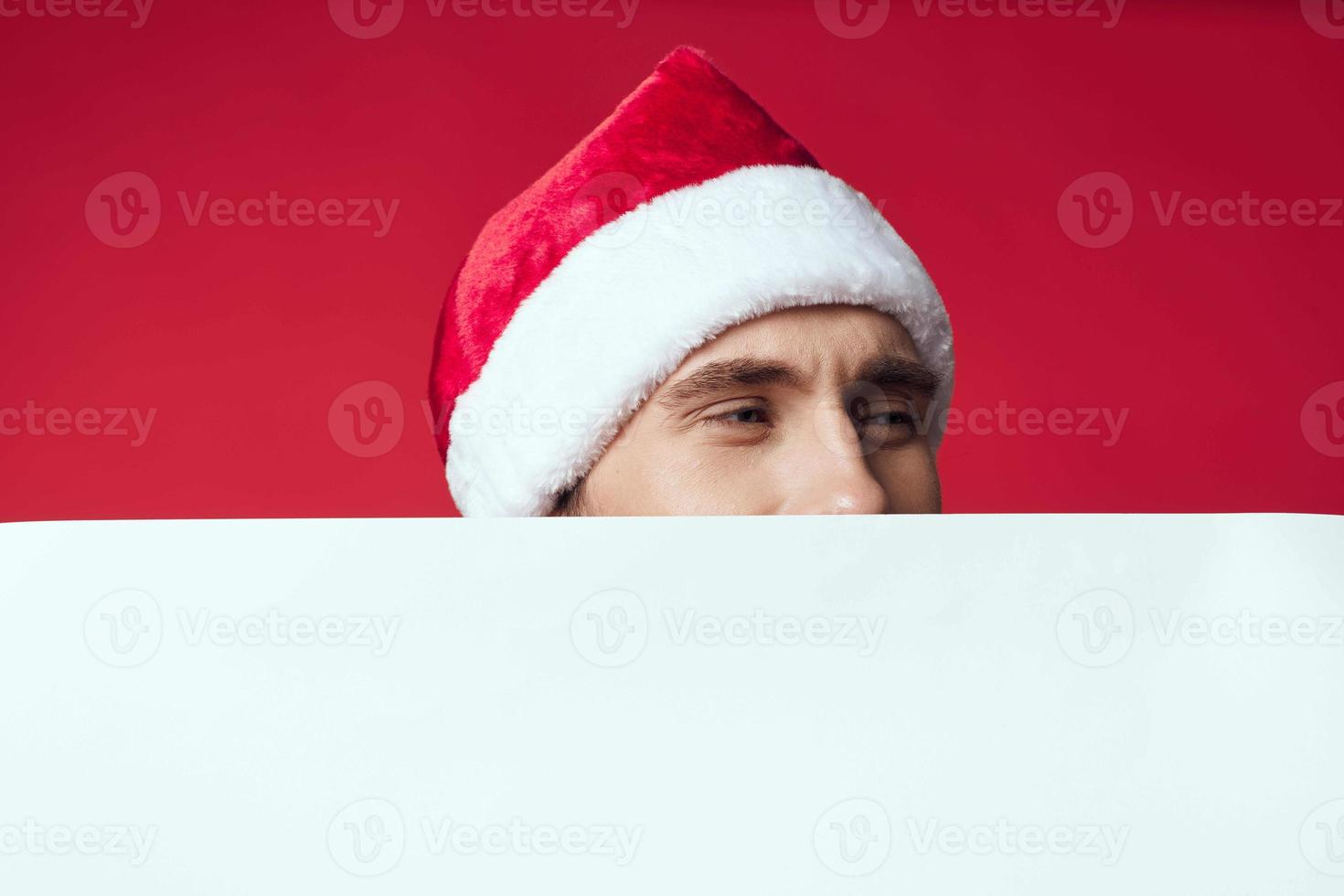 Cheerful man in a christmas white mockup poster studio posing photo