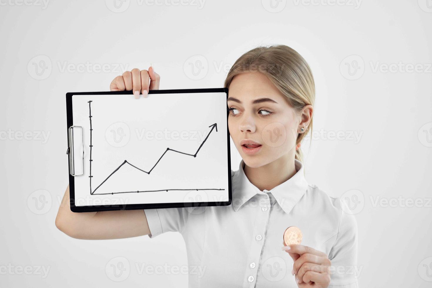 cheerful woman in a white shirt with a folder in hand technologies photo