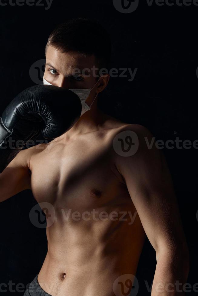 boxer gloved naked torso muscle fitness black background circumcision photo