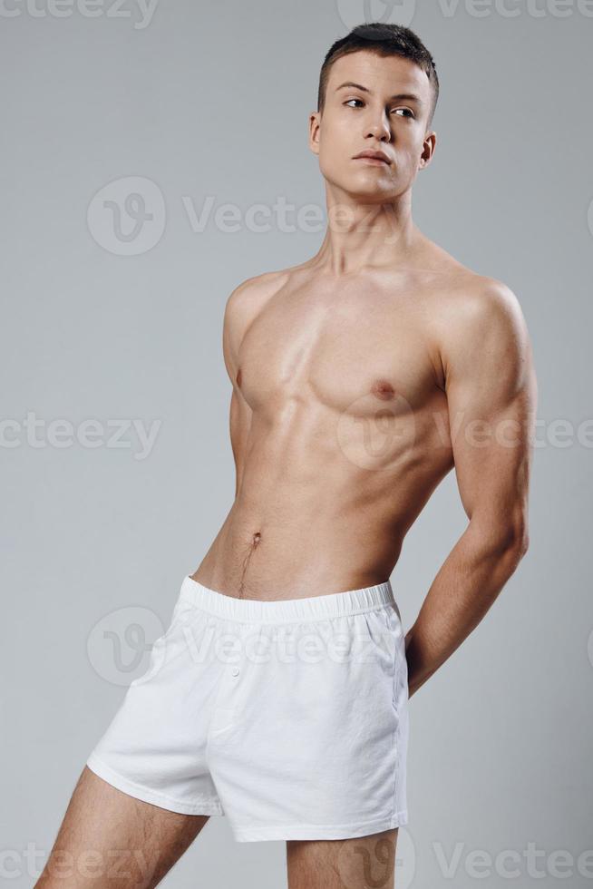 attractive bodybuilder muscular torso fitness model Copy Space photo