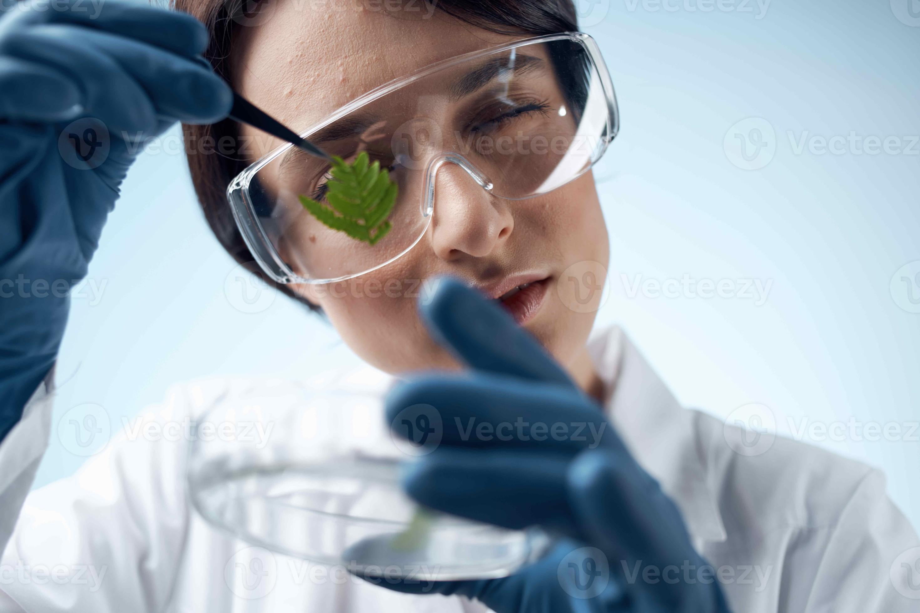 Woman in white coat biology research diagnostics science 22066937 Stock