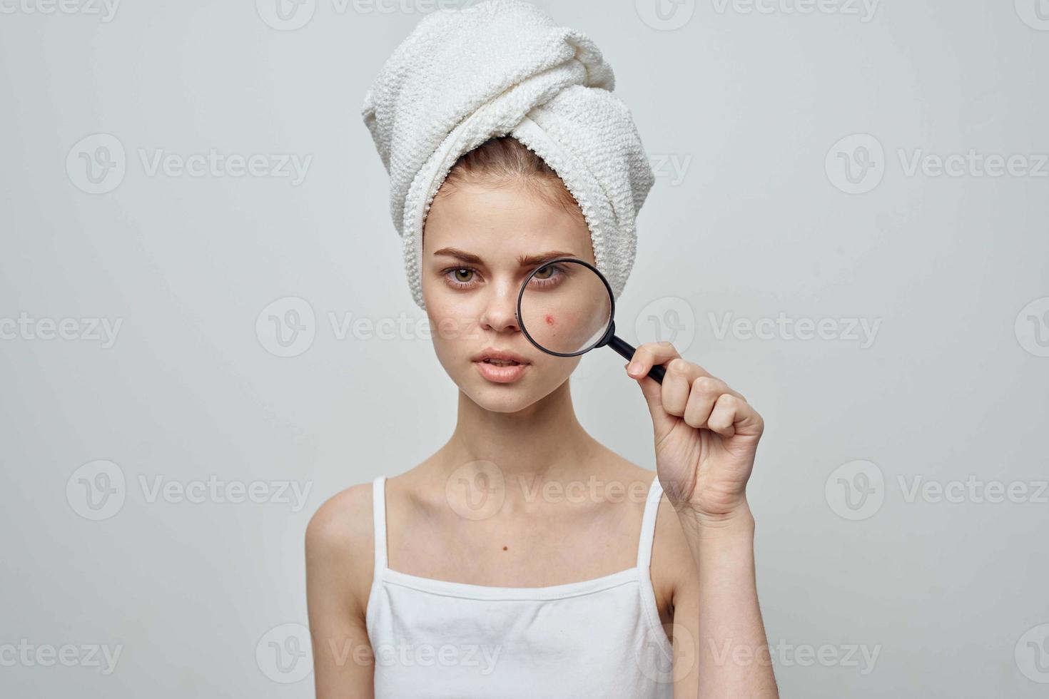 beautiful woman with a pimple on the face skin problems close-up photo