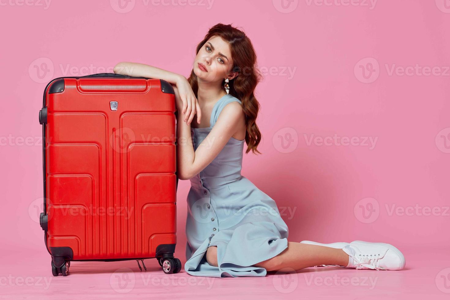woman tourist red suitcase passenger travel fun lifestyle photo