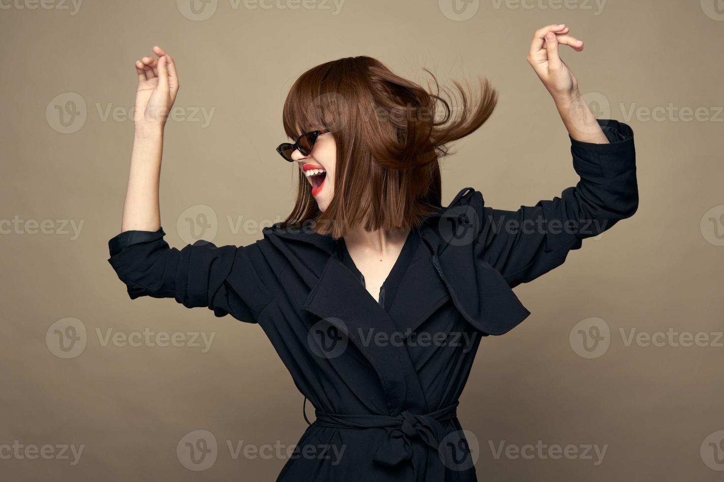 Funny lady fashionable clothes self-confidence rejoicing on an isolated background photo