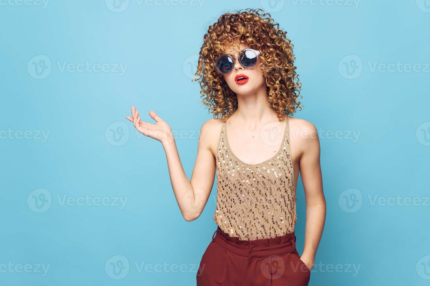 Sexy model Curly hair red lips attractive look model bright makeup photo