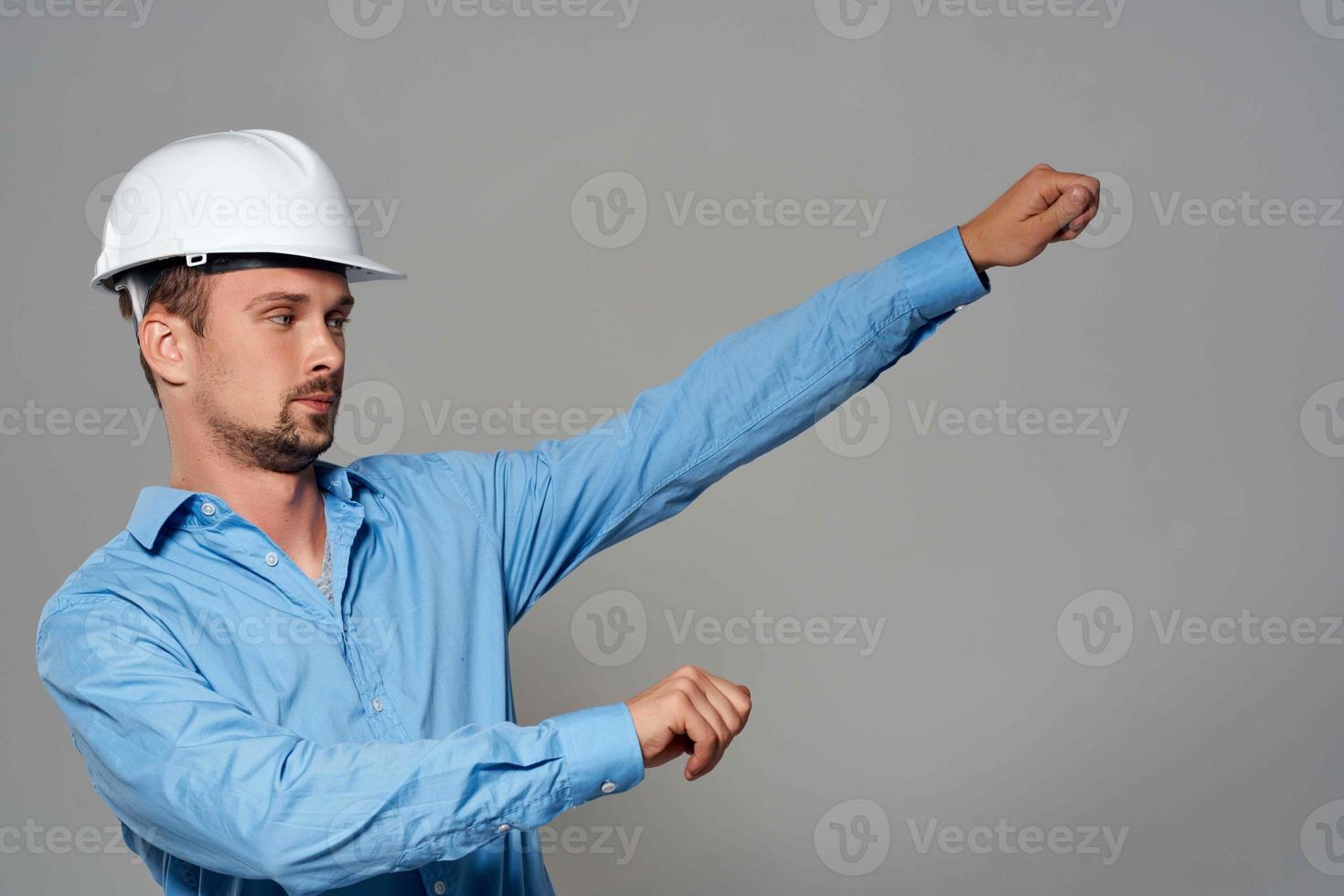 emotional man in construction helmet engineer work industry photo