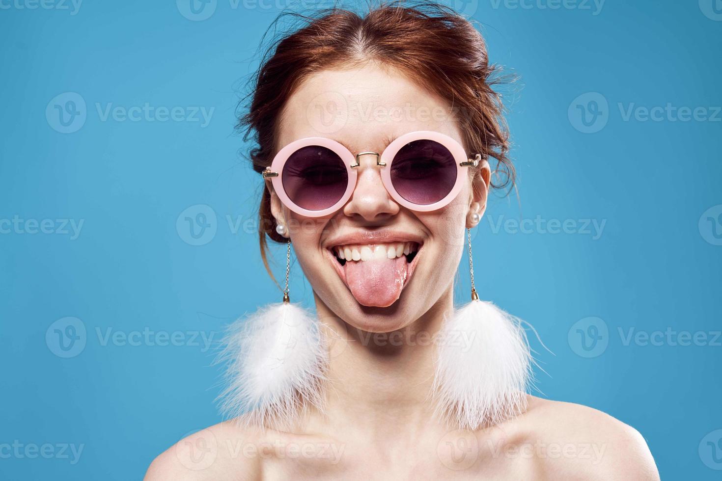 cheerful woman with bare shoulders round glasses decoration emotions photo