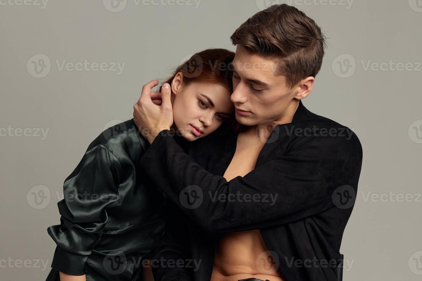 Man and woman are standing side by side hugs intimacy tenderness relationship romantic photo