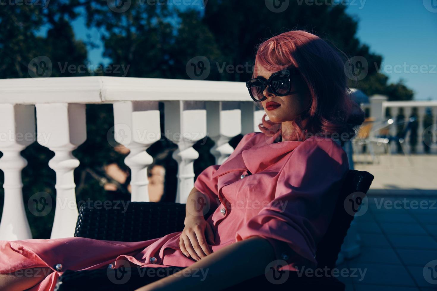 attractive woman pink hair sunglasses leisure luxury vintage sunny day photo