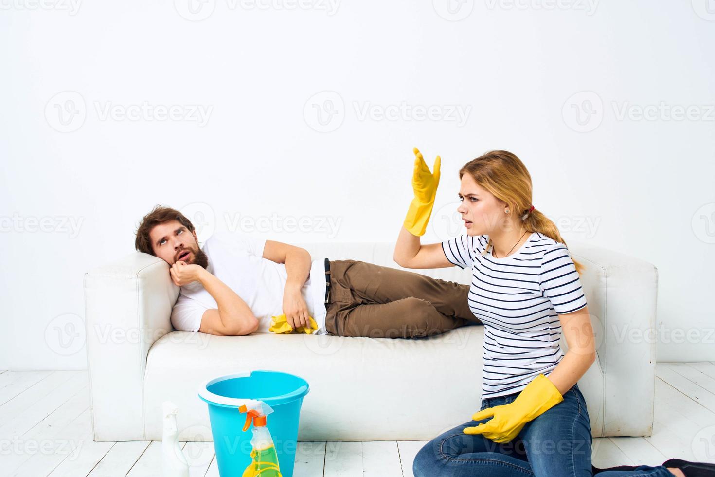 Married couple in the room doing housework lifestyle services photo