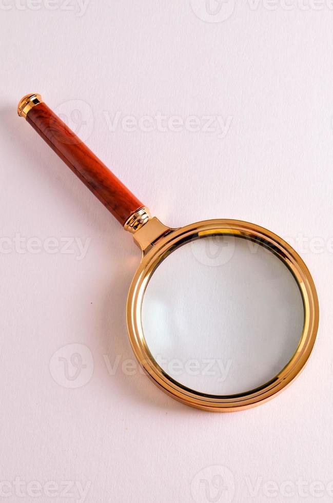 Isolated magnifying glass photo