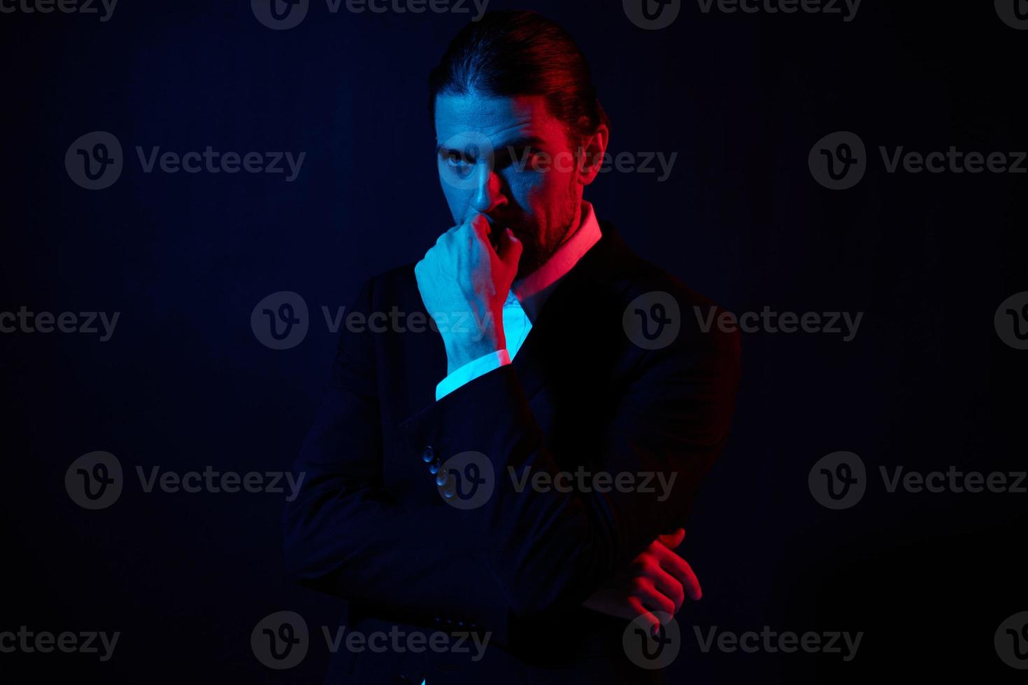 portrait of a man modern style suit fashion dark background photo