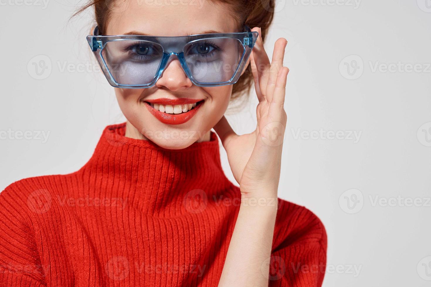 beautiful woman modern style sunglasses light background photo