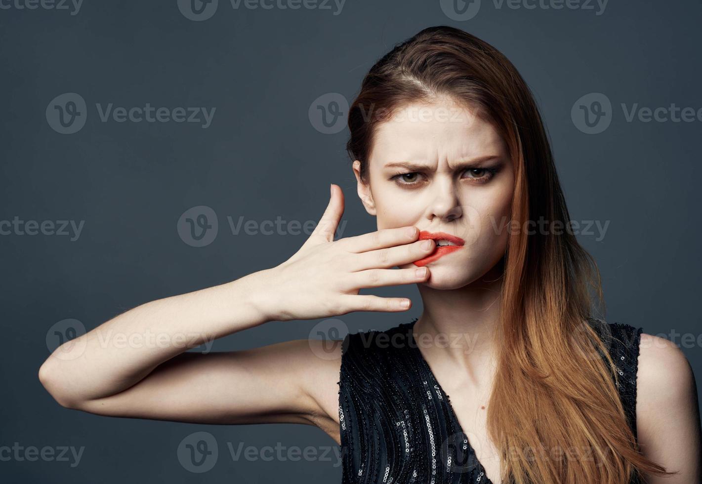 Charming woman smears lipstick all over her face 22070911 Stock Photo ...