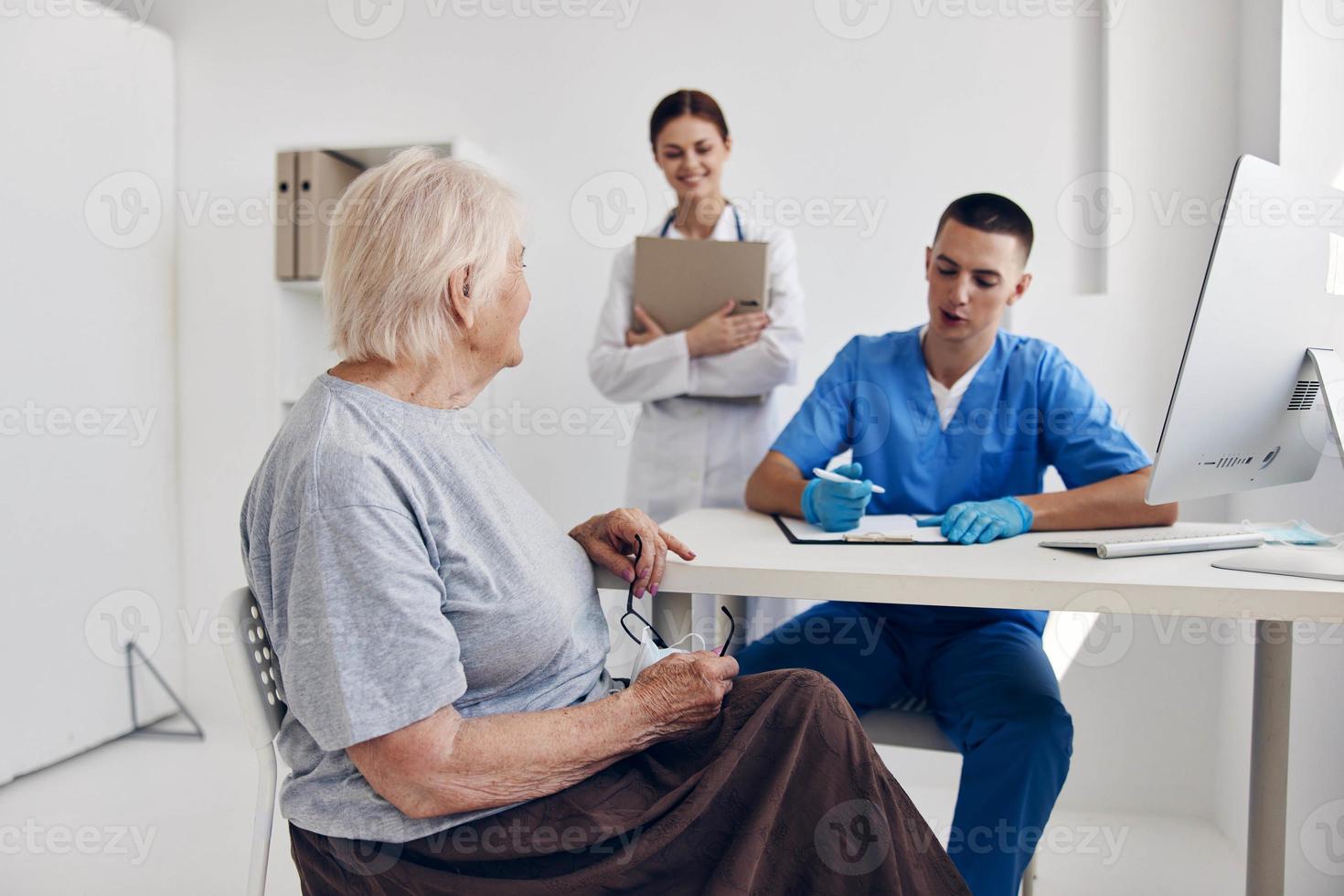 elderly woman communication with a doctor health care photo