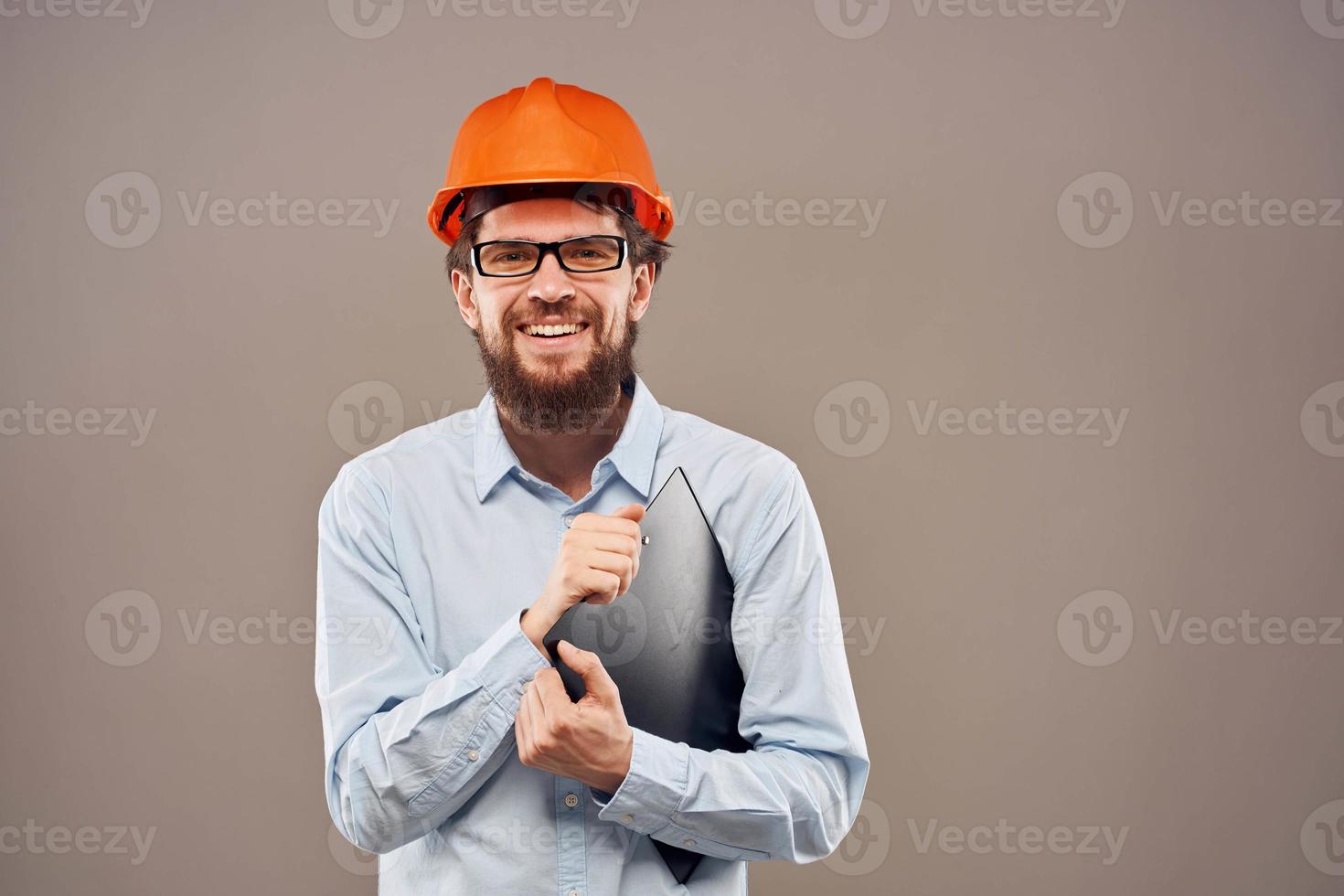 Business man in orange paint security papers work cropped view photo