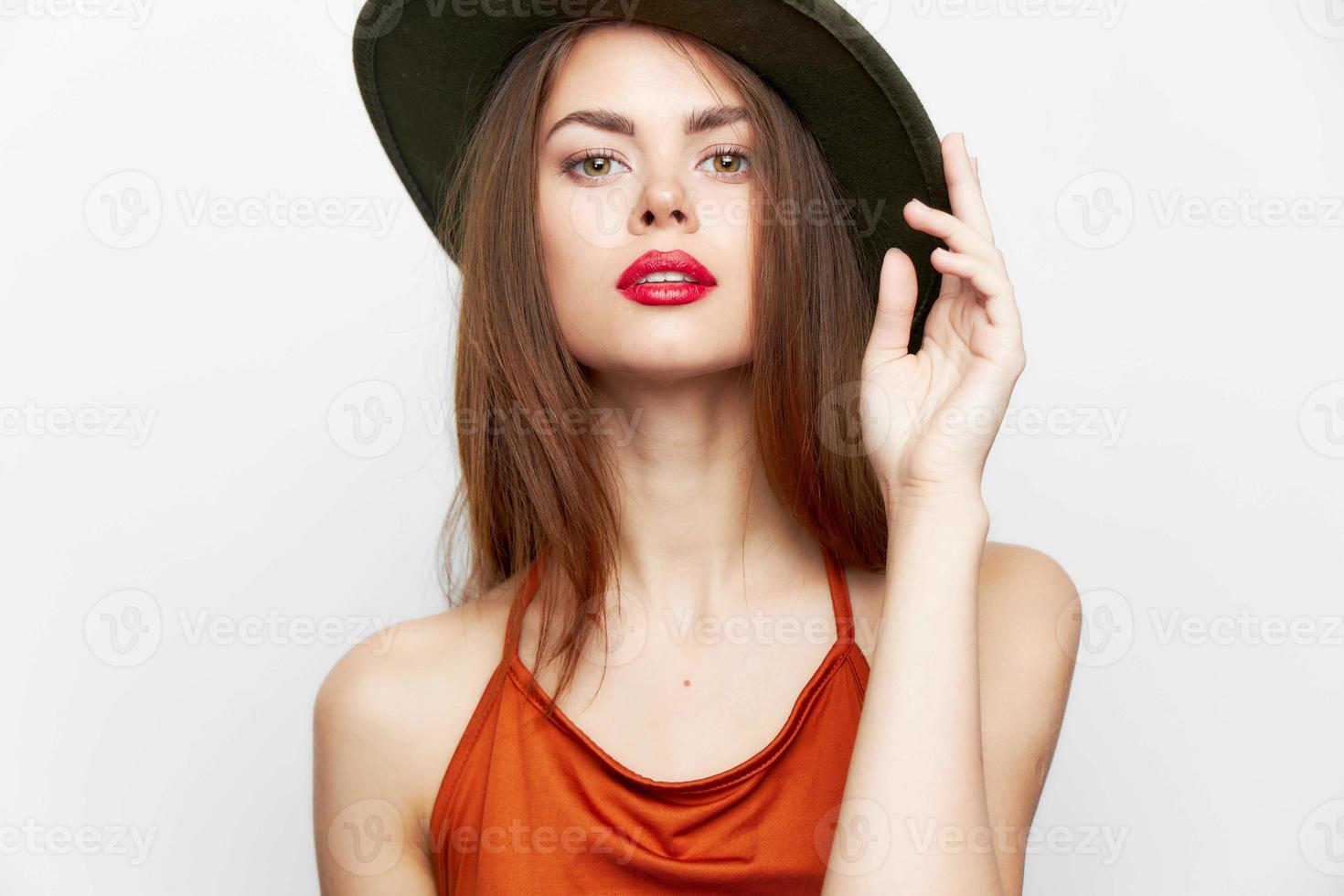 Elegant woman red lips hat forward lifestyle glamor model photo